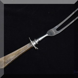 S02. Sterling handle carving fork.
